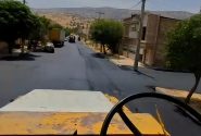 ادامه عملیات گسترده آسفالت‌ریزی و لکه‌گیری معابر شهری سرابله + فیلم